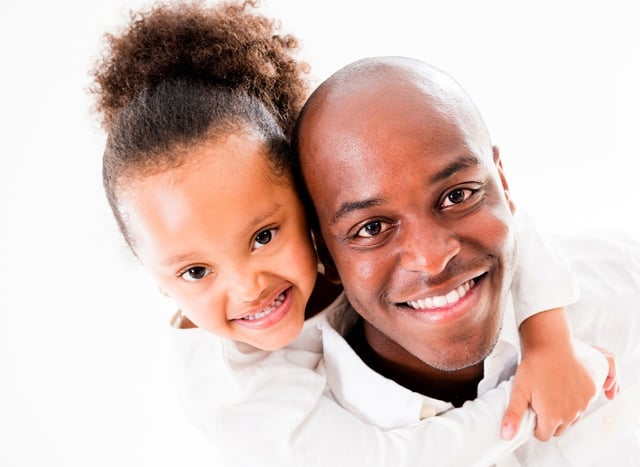 Cute portrait of a father and daughter - isolated over white .jpeg